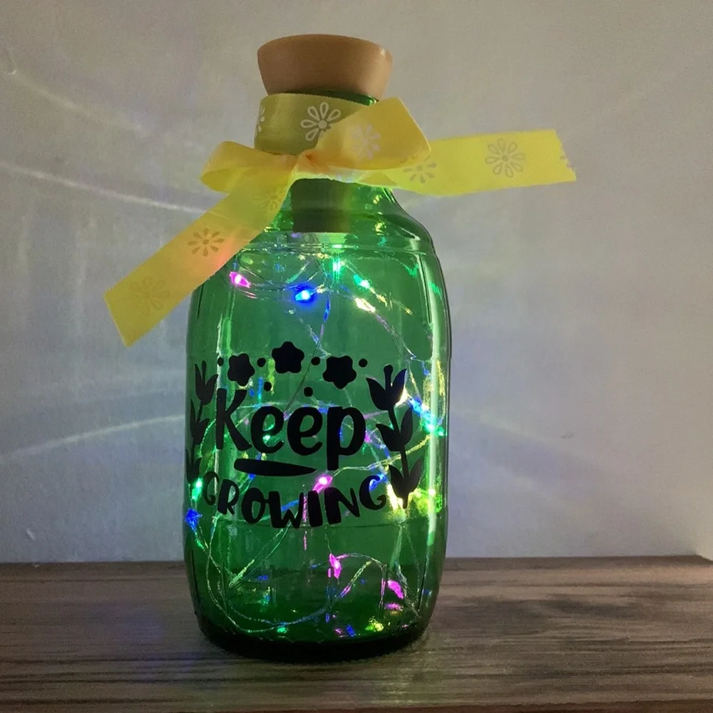 ‘Keep Growing’ green glass barrel solar lantern